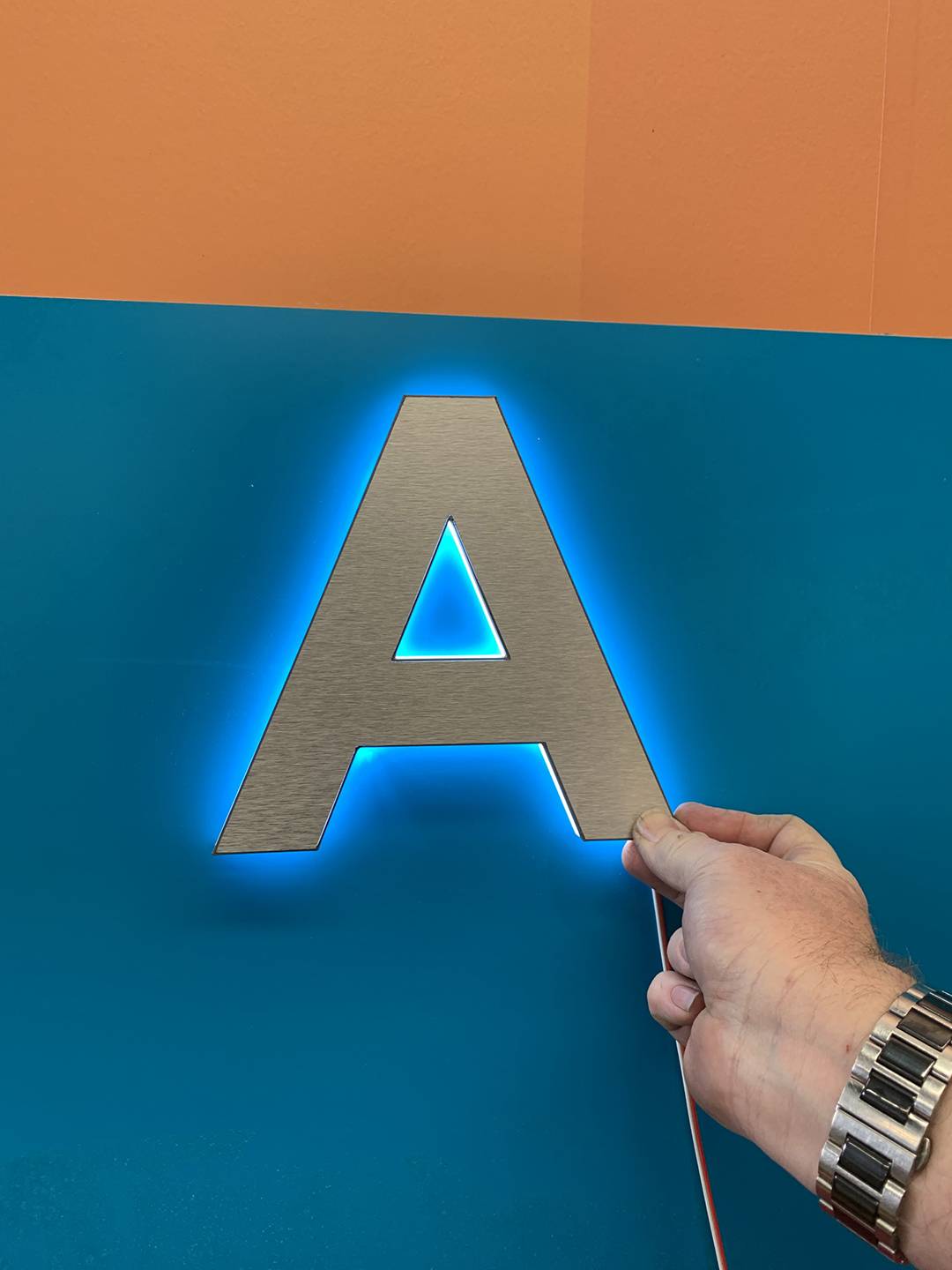 Halo lit 3D printed letter with brushed aluminium face